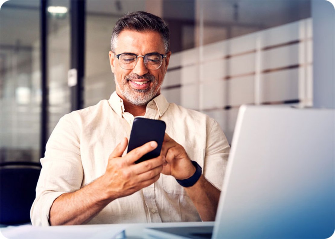 Man reviewing air quality data on a mobile phone.