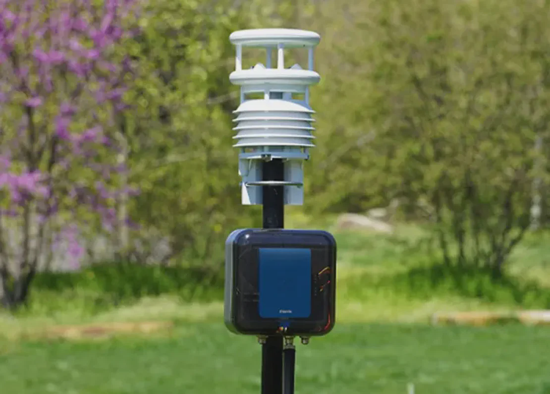 Aethair Thiamis transmitting environmental data from inside an Aethair Node enclosure connected to a weather sensor.