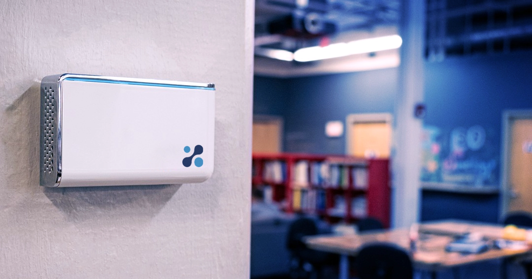 Aethair IAQ device mounted in a modern office space supporting continuous indoor air quality monitoring.