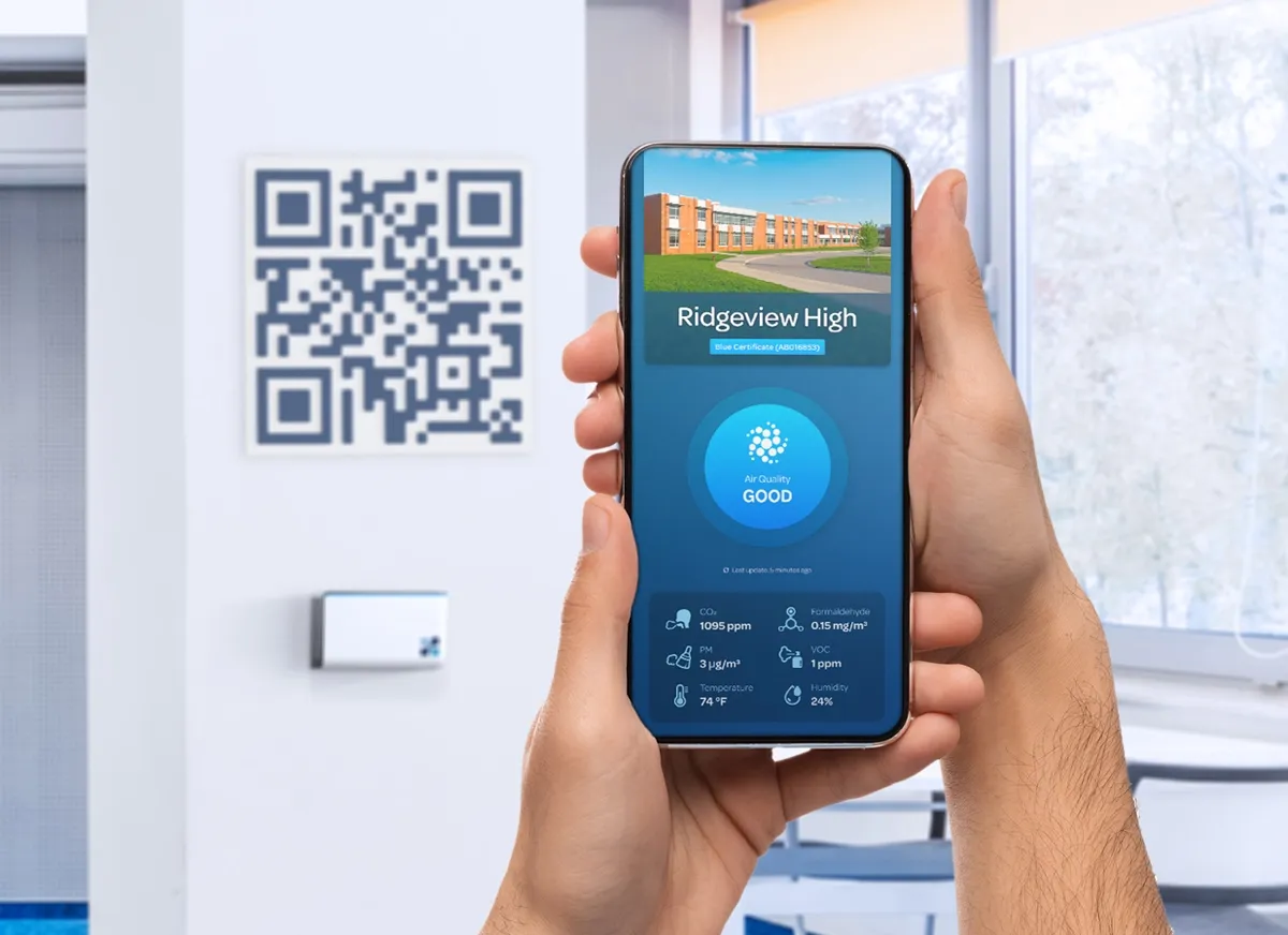 A QR code at a school that opens a live Aethair air quality dashboard on a phone.