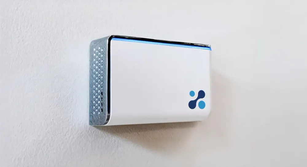 Aethair IAQ mounted on a white wall.