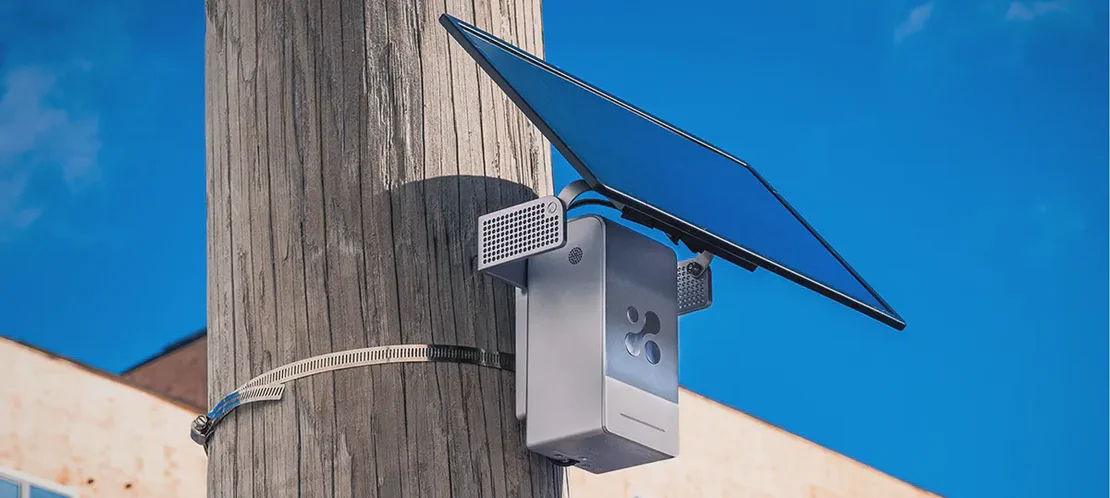 Aethair PRO with a solar panel mounted on a telephone pole outdoors.